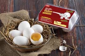 Fresh eggs displayed in a rustic basket